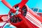 Red retro propeller engine airplane