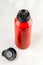 Red reusable steel water bottle with open cap