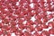 Red Rhinestone background. Heart shape texture as backdrop white studio photo. Bling rhinestone crystal pattern