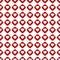 Red rhombuses seamless pattern with white hearts. Vector illustration.