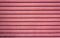 Red ribbed metal texture