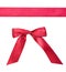 Red ribbon with a bow isolated on white