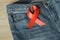 Red ribbon on the Genie is a symbol of struggle and awareness AIDS