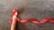Red Ribbon Support HIV, AIDS and have finger