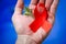 Red ribbon for world aids day awareness campaign background