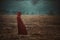 Red riding hood alone in a desolate land