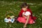 Red riding hood picking daisies