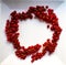 Red ripe currants on a white background. Wreath of berries