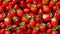 Red ripe strawberries background. Close up, top view. Generative AI