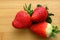 Red ripe Strawberries on bamboo background