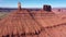 Red Rock Butte Formation In Desert Valley Aerial Shot Bottom Up