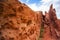 Red rock mountains landscape. Rocky mountain scenery. Close up holes. Mountain tops in the background