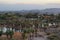 Red Rocks of sandstone with lagoon and palm trees at Papago Park