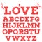 Red romantic alphabet with love inscription made of small red heart shapes on white background.