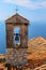 Red roof chapel cross with Mediterranean sea view at the French