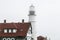 Red Roof and Foggy Lighthouse