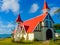 Red roofed church in Cap Malheureux