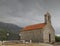 Red roofed church stone church