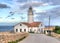 Red Roofed Lighthouse Building Of Punta De Capdepera In Front Of The Sea Near Cala Rajada On Balearic Island Mallorca