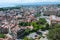 The red roofs of medieval buildings in the city center of Lausanne and the lake at the background