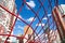 The red ropes in the form of web houses on the background in the backlight of the setting sun. Children sport Hobbies urban enviro