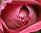 Red rose bud flower in top view extreme close up