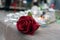 red rose and candles in the street in memory of the   professor of history Samuel Paty murdered by an islamist in the