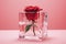 Red rose in ice cube on a pink background with copy space