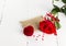 Red rose, love message, casket with a ring