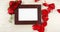 Red rose petal falling on the photo frame 4k