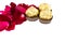 Red rose petals with Chocolate ball on white