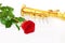 Red rose, saxophone and notes