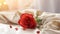 Red rose on the silk bedsheet. Happy Valentine\\\'s Day greeting card concept.