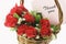 Red Roses and Greetings Card in Basket