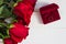 Red roses romantic proposal background white wooden.