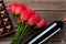 Red roses, wine bottle and chocolate box