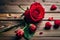 red roses on wooden table red roses on wooden background red rose on wooden background