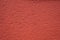Red roughcast background texture