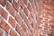 Red round brick wall pattern. Photo background