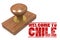 Red rubber stamp with welcome to Chile