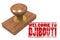 Red rubber stamp with welcome to Djibouti