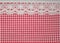 Red rural cloth and lacy ribbon vintage style background texture