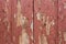 Red rustic reclaimed wooden wall background.