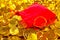 From red sack scattered pile of gold coins