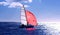 Red sail dinghy