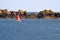 Red sailboat in the Atlantic Ocean