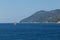 Red sailboat sailing on Aegean sea