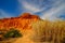 Red sandstone cliffs on the beach the Praia da Rocha Baixinha Nascente. Region Faro, Algarve, Portugal