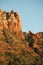 Red sandstone mountain formation, in Arizona in the U.S. Southwest with sheer cliff face.