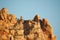 Red sandstone mountain formation, in Arizona in the U.S. Southwest with sheer cliff face.